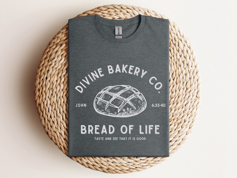 Faith-based sourdough t-shirt with a Bible verse, perfect for a birthday gift for her or a sourdough-themed gift for a friend. This Christian baking shirt is a great sourdough gift for bread lovers who enjoy faith-inspired apparel and scripture-based designs.