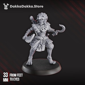 May include: A gray 3D-printed miniature of a warrior figure, approximately 33 mm tall from feet to eyes. The figure is posed with a curved blade and a cleaver. The figure is wearing armor and a feathered headdress. The store logo "DakkaDakka.Store" is in the top left corner.