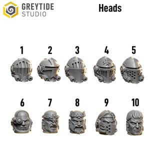 May include: A collection of ten gray miniature heads, each with a unique design. The heads are numbered 1 through 10. The text "GREYTIDE STUDIO" and "Heads" are visible in the image.