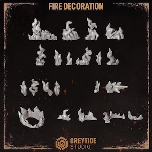 Puede incluir: Una colección de decoraciones en miniatura con forma de fuego, de color gris y sin pintar, en varias formas y tamaños, incluyendo grupos de llamas y volutas individuales. El texto FIRE DECORATION y GREYTIDE STUDIO aparece en la imagen.