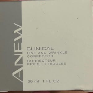 May include: A white and gray box of ANEW Clinical Line and Wrinkle Corrector. The box has the product name and description in English and French. The box contains 1 fl. oz. of product, which is equivalent to 30 ml.
