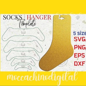 May include: A digital download template for creating sock hangers. The template includes five different sizes of sock hangers, with a gold sock hanger shape on the right side of the image. The text "Socks Hanger Template" is at the top of the image, and the text "moccachinodigital" is at the bottom of the image. The text "5 size SVG PNG EPS DXF" is on the right side of the image.