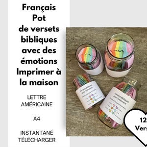 Une image de pots de 2 pintes et de pots de 2 litres remplis de bouts de papier plié en rose, orange, jaune, vert, bleu et violet.  Une étiquette blanche autour des pots qui dit de prendre la couleur de l'émotion coordonnée que vous ressentez
