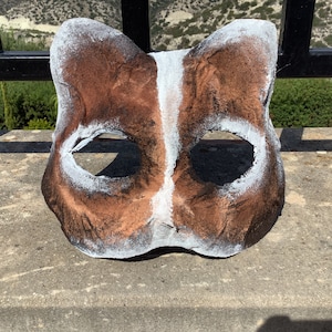 Brown and white therian cat mask
