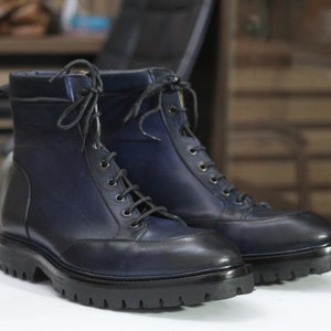 Navy blue patina leather boot mens lug sole
Apron toe leather boot navy blue lace up