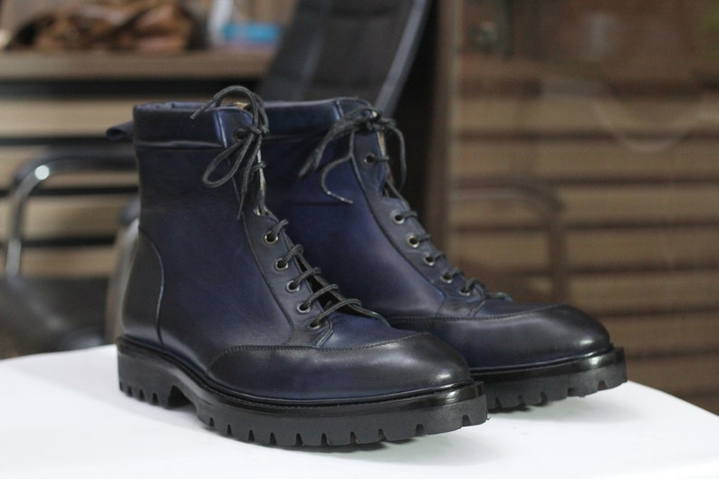 Navy blue patina leather boot mens lug sole
Apron toe leather boot navy blue lace up