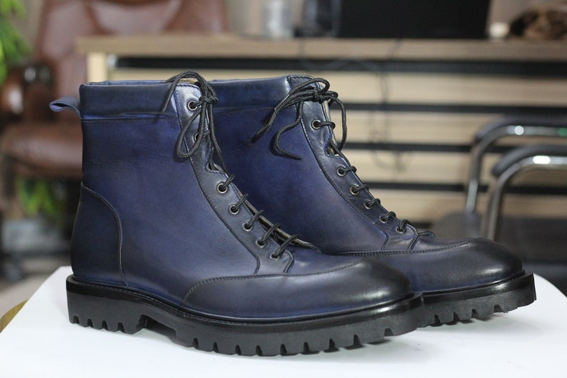 Lace up leather boot mens lug tread sole
Mens handmade boot lug sole side profile navy