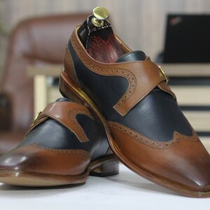 Mens dress shoe black tan leather side profile