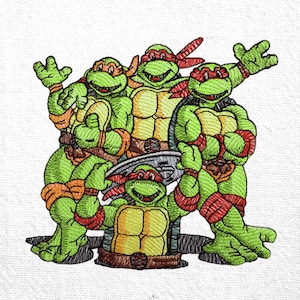 May include: Embroidered image of the Teenage Mutant Ninja Turtles. The turtles are green with different colored headbands: orange, red, blue, and purple. They are standing together, with one holding a silver weapon.