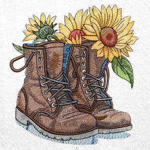 May include: A pair of brown leather boots with laces, decorated with sunflowers. The boots have a blue trim around the top.