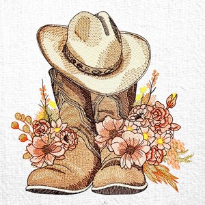 Può includere: Un paio di stivali da cowboy marroni con un cappello da cowboy marrone in cima. Gli stivali sono decorati con fiori rosa e arancioni.