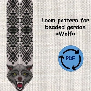 May include: A loom pattern for a beaded gerdan featuring a wolf design. The pattern is in black, gray, and white, with a geometric design at the top and a wolf's head at the bottom. The text says "Loom pattern for beaded gerdan «Wolf»".