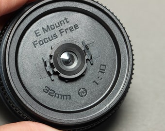 Disposable Camera Lens for Sony E mount, Dispolens Free Focus Pancake Biscuit Lens