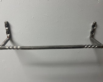 Double Twisted towel holder forged in Vermont. 3/8 square solid steel. Can be right hand, left hand mount. Comes in natural or matte black.