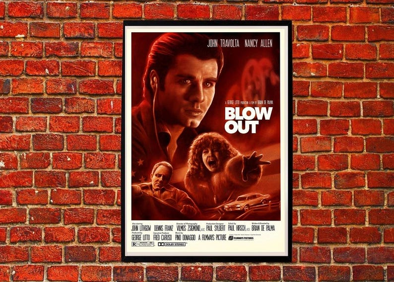 May include: A vintage movie poster for the film "Blow Out" starring John Travolta and Nancy Allen. The poster features a red and white color scheme with a close-up of John Travolta's face. The title of the film is in large, bold letters.