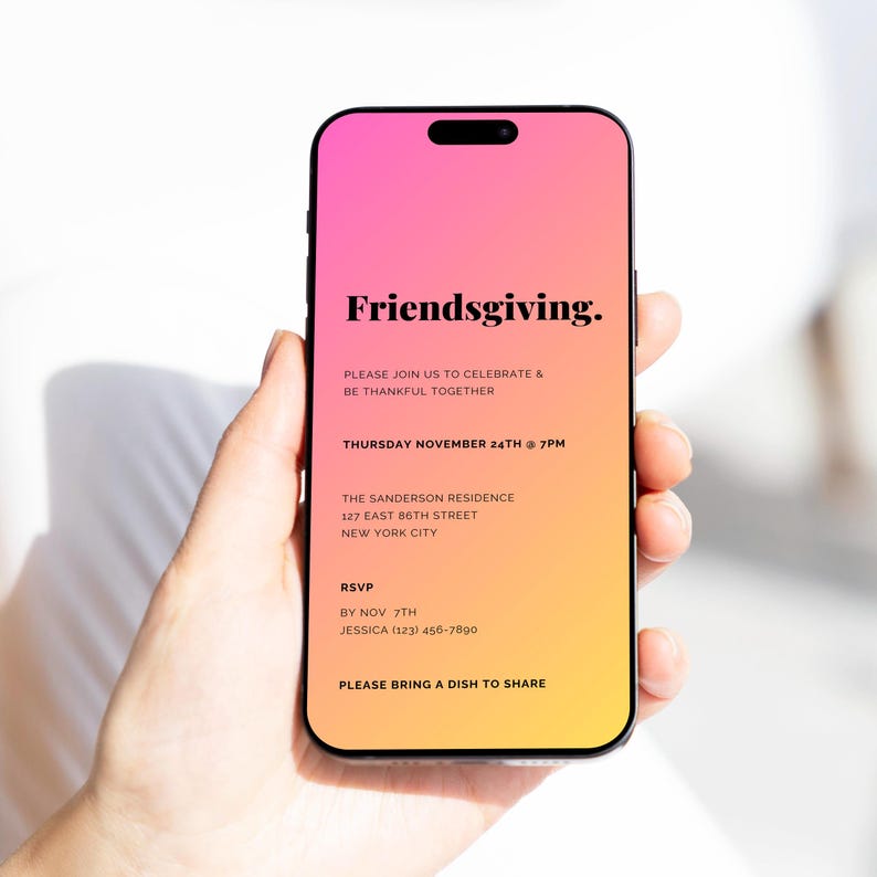 May include: A smartphone screen displaying a Friendsgiving invitation with a pink and orange gradient background. The invitation includes the date, time, location, and RSVP information. The text reads: "Friendsgiving. Please join us to celebrate & be thankful together. Thursday November 24th @ 7PM. The Sanderson Residence 127 East 86th Street New York City. RSVP By Nov 7th Jessica (123) 456-7890. Please bring a dish to share."