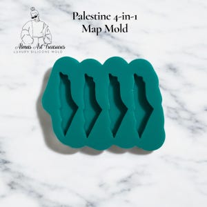 Könnte beinhalten: Eine tealfarbene Silikonform mit vier Abdrücken der Palästina-Karte. Die Form ist mit "Palestine 4-in-1 Map Mold" beschriftet und stammt von "Almas Art Treasures". Sie dient zur Herstellung von kartenförmigen Objekten.