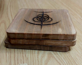 Dessous de verre en bois gravé des grandes runes Elden Ring - Fans d'art
