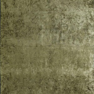 May include: A textured green rug with a subtle sheen. The rug has a distressed look, giving it a vintage feel.