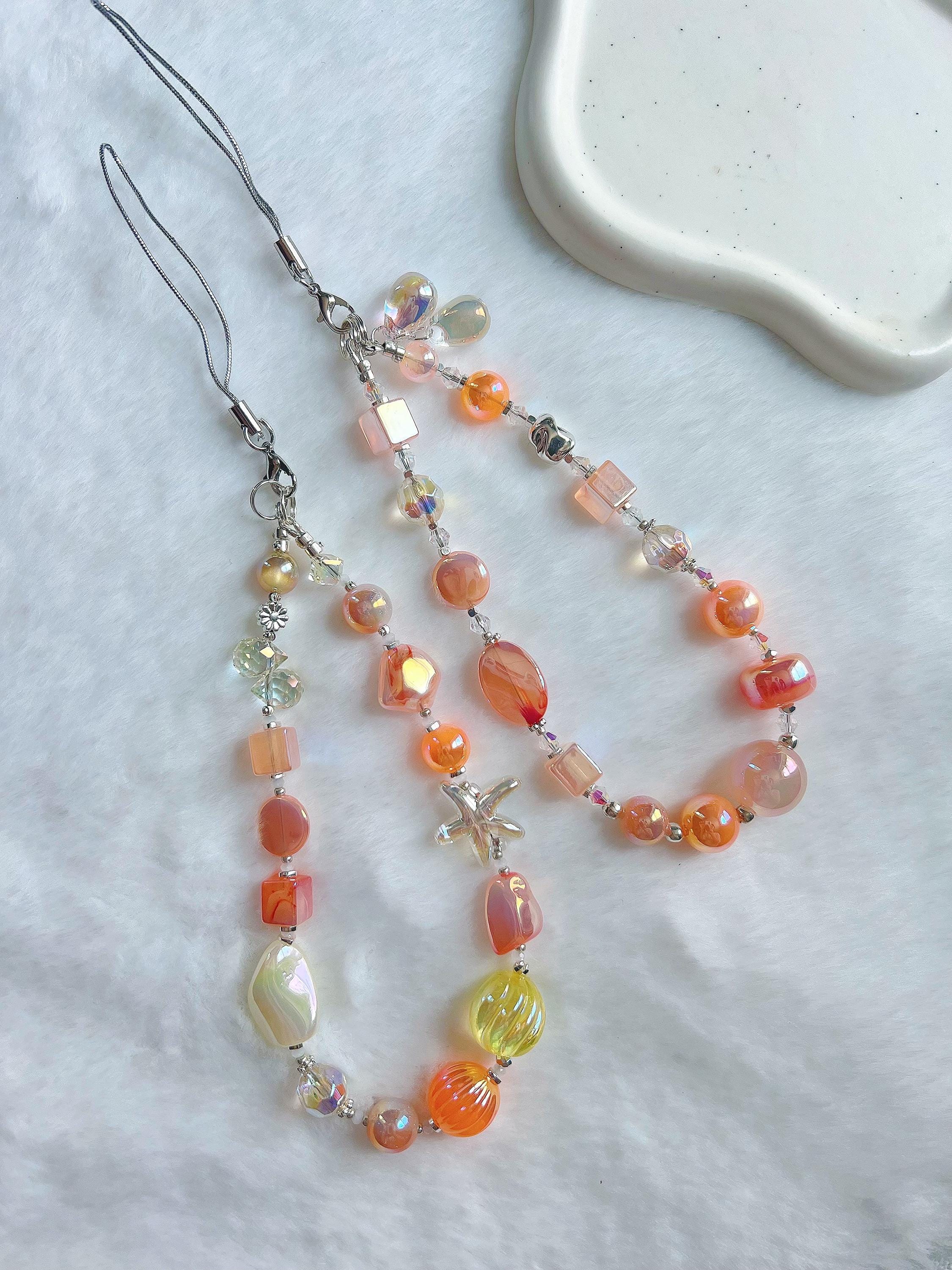 Sillage / ハンドメイド ビーズグラスホルダー オレンジ ビーズ付き携帯ストラップ：サマーオレンジ ボヘミアンアクセサリー