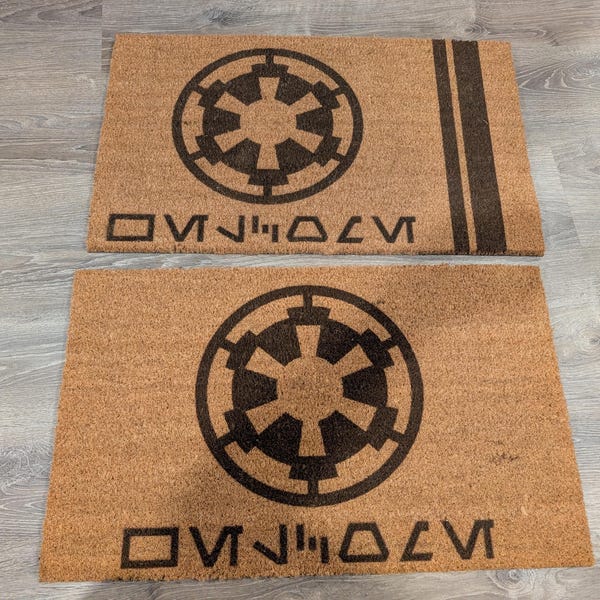 Paillasson de bienvenue Aurebesh à rouage impérial 30 x 18 po. 2 styles disponibles