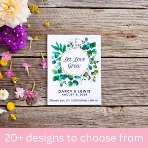 May include: A white card with a watercolour design of green leaves and a gold circle with the text "Let Love Grow". The card also includes the text "Darcy & Lewis August 9, 2025 Thank you for celebrating with us."