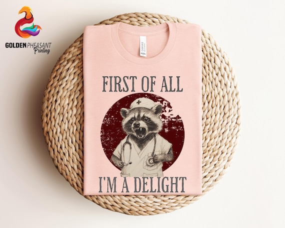 Nurse Shirt, First Of All I'm A Delight, Raccoon Nurse Tee, Raccoon Hoodie, Funny Nurse Shirt, Sarcastic Tee, Funny Saying Shirt,Nurse Gifts