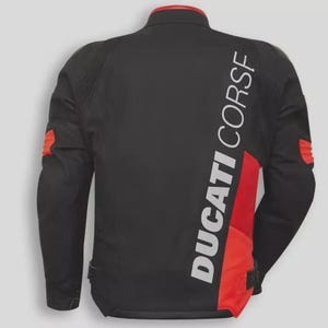 May include: Black motorcycle jacket with red accents and the text "DUCATI CORSE" in white. The jacket has a red collar and red panels on the sleeves. The back of the jacket is visible.