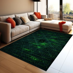 May include: A green and black area rug with a geometric pattern of lines and circles. The rug has a modern, abstract design.