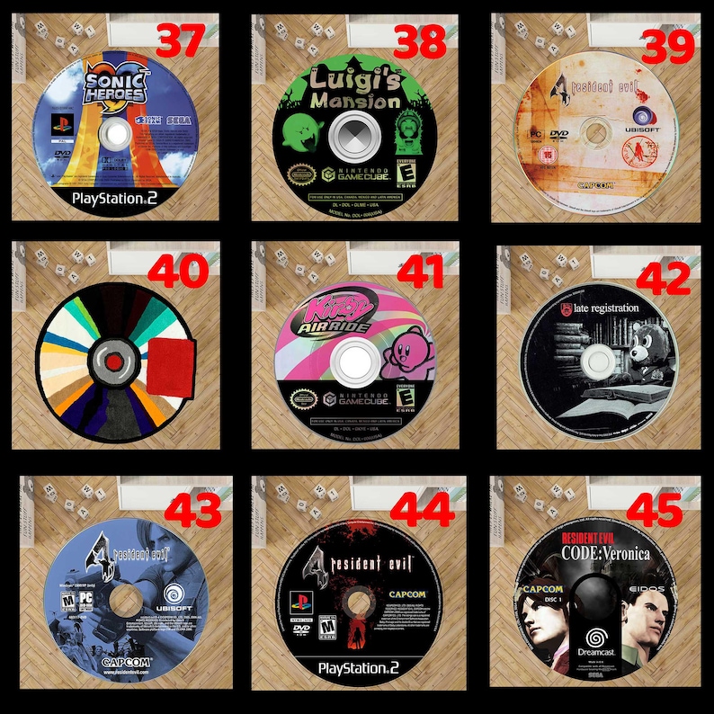 Pode incluir: Nove discos de videojogos, cada um com obras de arte e t&iacute;tulos &uacute;nicos. Os t&iacute;tulos incluem "Sonic Heroes", "Luigi's Mansion" e "Resident Evil". Os discos est&atilde;o dispostos numa grelha, mostrando v&aacute;rias capas e log&oacute;tipos de jogos.