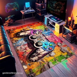 May include: A colorful rug with a large, black and purple video game controller in the center. The controller is surrounded by splashes of paint in various colors, including yellow, orange, red, green, and blue. The rug has a distressed, vintage look.