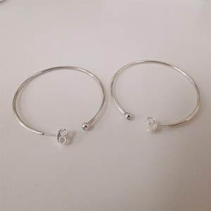 Pendientes Pandora de plata, aros de versatilidad.