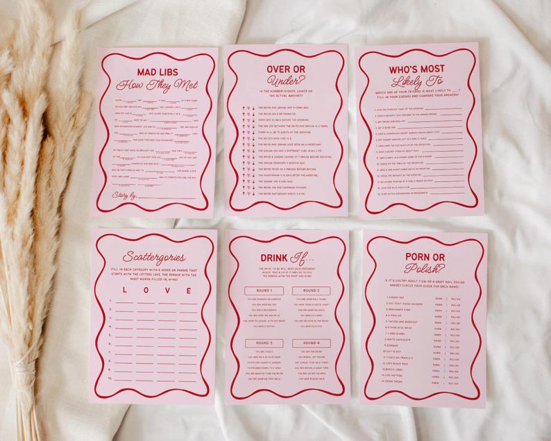 K&ouml;nnte beinhalten: Sechs rosa Spielkarten mit rotem Text und Rahmen. Die Karten sind mit "Mad Libs: How They Met", "Over or Under", "Who's Most Likely To", "Scattergories", "Drink If" und "Porn or Polish" betitelt.