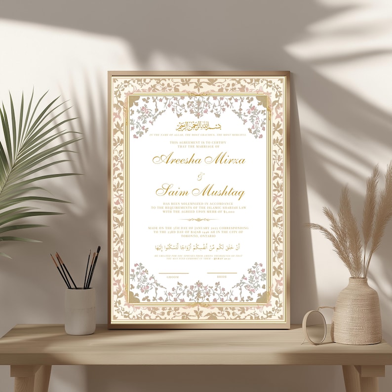 May include: A gold and white wedding certificate with an ornate floral border. The text reads "This agreement is to certify that the marriage of Areesha Mirza & Saim Mushtaq has been solemnized in accordance with the requirements of the Islamic Shariah Law on the 17th day of June 2023 in the city of Toronto, Ontario."