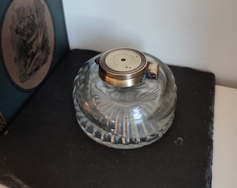 Antique glass ink well with brass flip lid