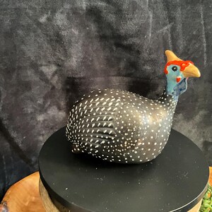 Beautiful 6.5” long spotted fowl earthenware figurine; Guinea fowl hen stoneware figurine