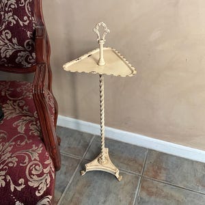 Antique iron cigar stand; vintage triangle side table; Antique Findlay standing floor ashtray