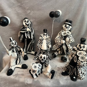 Vintage Mexican Papier Mâché black and white Clown family; set of six vintage signed Mexican clown figurines