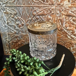 Vintage (possibly antique) Crystal/glass dresser/vanity jar with bronze or silver plate(?) repousse lid;art nouveau trinket jar/tobacco jar