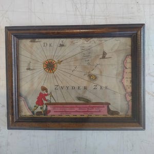 Cadre pour cabinet de curiosités, rose des vents de l'ancienne mer du Sud aux Pays Bas.