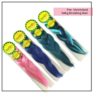 May include: Four packs of pre-stretched silky braiding hair in pink, blue, teal, and blue and teal ombre. Each pack has a yellow label with the text "RastAfri" and "Pre-Stretched" on it.