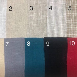 May include: A fabric swatch card featuring ten different linen fabric samples. The colors include white, beige, tan, light gray with white stripes, tan with white grid, light yellow, gray-blue, teal, black, and red.