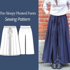 May include: Navy blue pleated pants with a tie waist, shown on a person. The image also includes a line drawing of the pants and the text "The Sleepy Pleated Pants Sewing Pattern" in white.