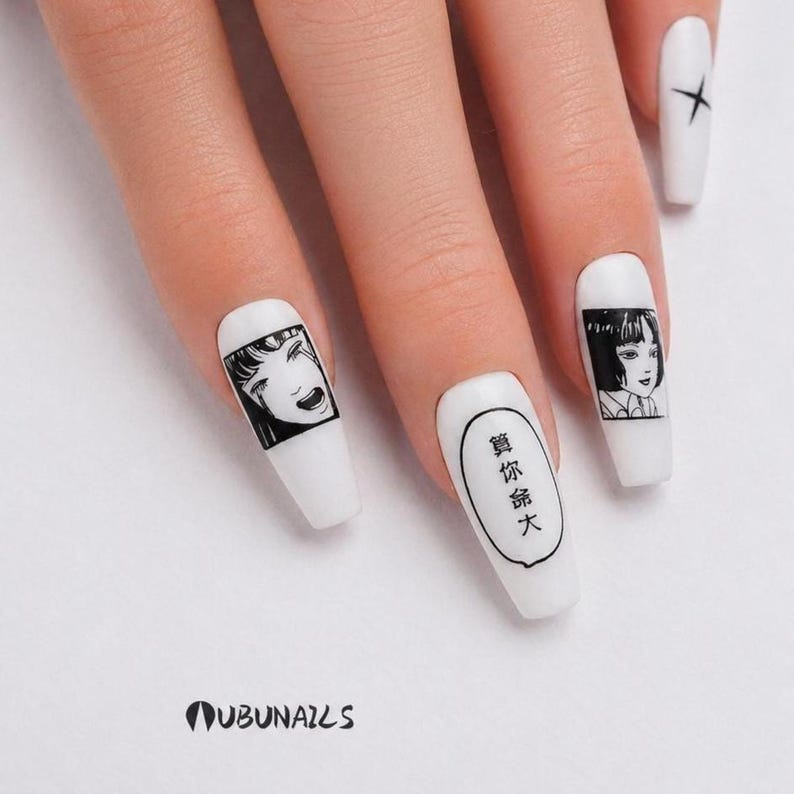 handmade matte press-on nails with a gothic Halloween theme. Each nail features black and white manga illustrations inspired by Junji Ito's Tomie, printed in comic panel style. Nails are sharp coffin shape, with high contrast matte finish and eerie graphic details. Ideal for cosplay, horror-themed birthday party, Halloween costumes or comic conventions. Customizable design by wubunails for gothic lovers. A perfect glue-on faux acrylic nail set for fans of Japanese horror and manga.