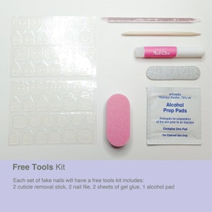 May include: A set of fake nails with a free tools kit, including two cuticle removal sticks, two nail files, two sheets of gel glue, and one alcohol prep pad. The kit also includes a nail glue bottle and a nail file.