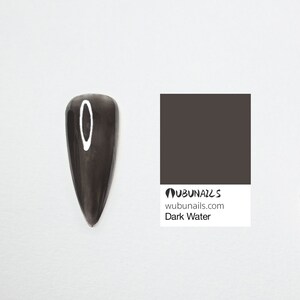 Handmade press-on nails in neon red, navy, purple, and chrome, featuring a mix of short and long shapes. Styles include minimalist city-girl daily wear, clean glossy finishes, and bold birthday party looks. Custom Freestyle grey nails, vibrant neon pure colors, and personalized faux acrylics. Each set is uniquely designed by wubunails for chic OOTD vibes. Perfect for gifting, events, or effortless beauty on the go. Includes glue-on options for every taste, from simple to dramatic.