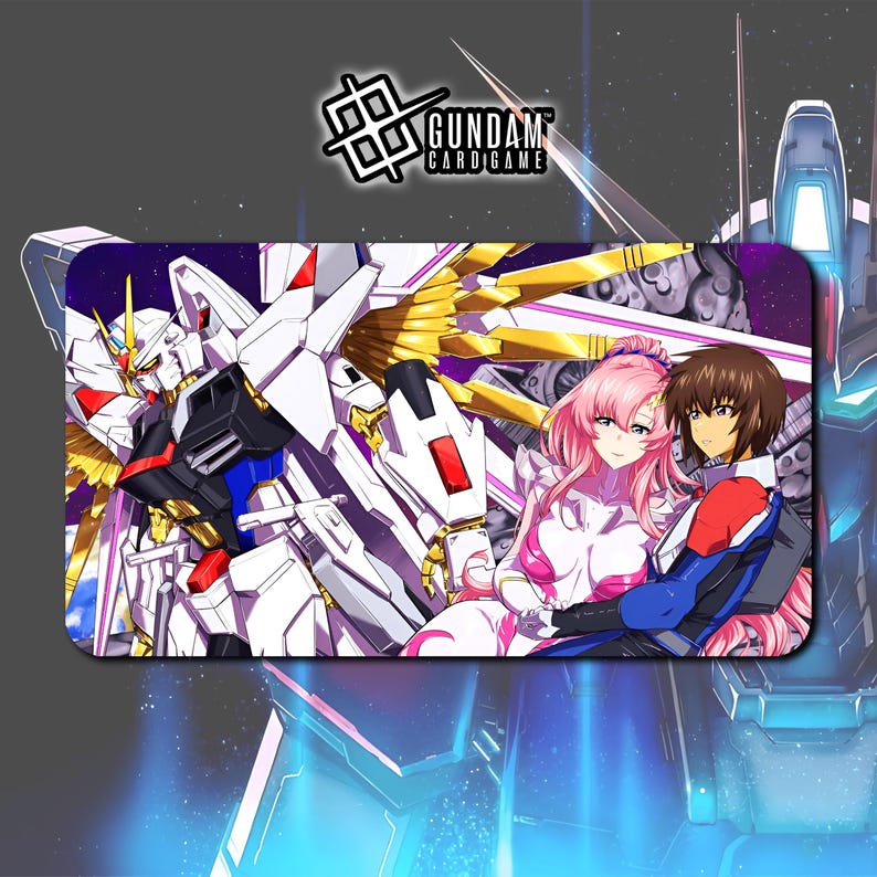 May include: A rectangular Gundam card game playmat featuring a white and gold mecha robot and two anime characters. The playmat has a dark purple background with the Gundam Card Game logo in the top left corner.