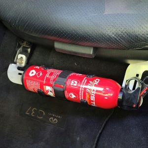 Universal under seat fire extinguisher mount. 14&quot; to 18&quot; adjustable mount.