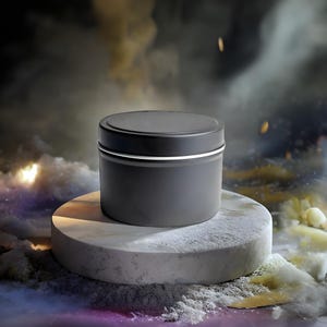 May include: A dark gray metal container with a matching lid and a silver band, set on a white, circular pedestal. The background features a cloudy, atmospheric scene with hints of light and color.