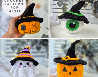 May include: A collection of four crochet Halloween-themed items. Includes an orange pumpkin with a black witch hat, a white ghost with a witch hat, a white eyeball with a green iris and a black witch hat, and an orange pumpkin with a black witch hat.